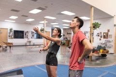 Trainer Guiding Client in San Fernando Valley Gym